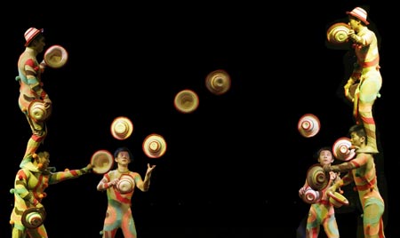 Members of the Zunyi Acrobatic Troupe from the Chinese National Acrobatic Circus perform during a show in Roquetas de Mar, southeast Spain, late August 12, 2007. 