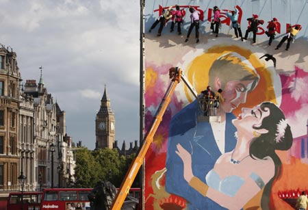 Bollywood film poster painters work on a giant film poster at the foot of Nelson's column in Trafalgar Square, as part of this year's Trafalgar Square Festival that takes its inspiration from the Mayor of London's India Now season, London, Britain August 16, 2007.