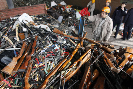 13,000 illegal firearms destroyed in Shanghai