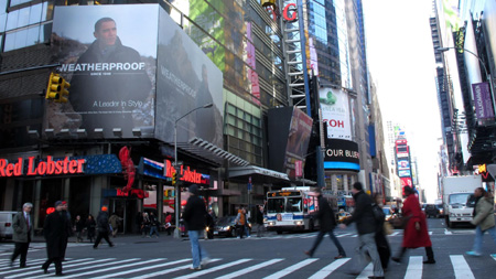Times Square billboard depicts Obama at Great Wall