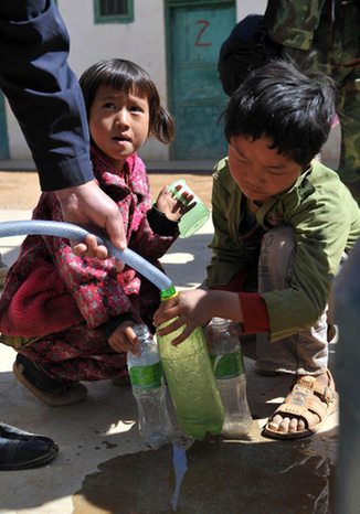 Children coping with life under dry skies