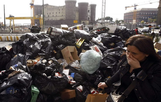 Stinky garbage piles in Naples street, Italy