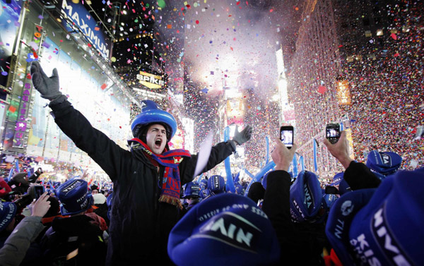 Revellers celebrate new year in Times Square in New York