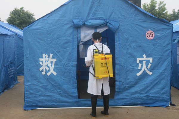 Flood and mudslide kill 29 in Central China