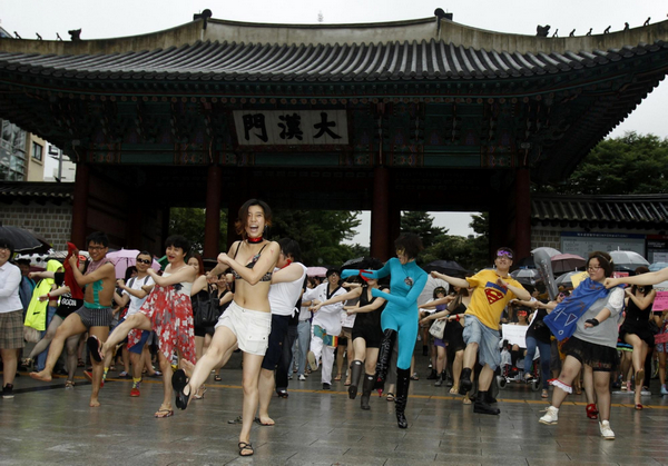 A woman takes part in a SlutWalk protest, in central Seoul July 16, 2011. About 100 protesters, mostly women, attended the SlutWalk protest march which became a movement of rallies around the world after a Toronto policeman suggested in January that women could avoid sexual assault by not dressing like a 'slut.' 'SlutWalk' marches in Seoul