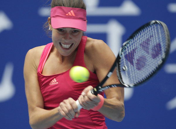 Ana Ivanovic of Serbia returns the ball to Agnieszka Radwanska of Poland during their quarter-final match in the China Open tennis tournament at the National Tennis Center in Beijing, October 7, 2011. Ivanovic sends Radwanska to China Open semis