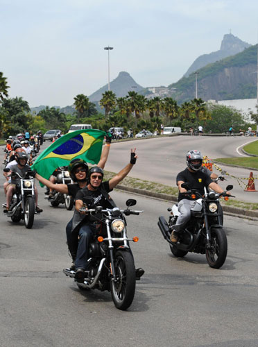 Harley-Davidson fans take part in a parade as the first festival held for the motorcycle enthusiasts in Rio de Janeiro, Brazil comes to a close, Nov 6, 2011. The festival started on Nov 4. Harley fans roar to the sound of samba in Brazil