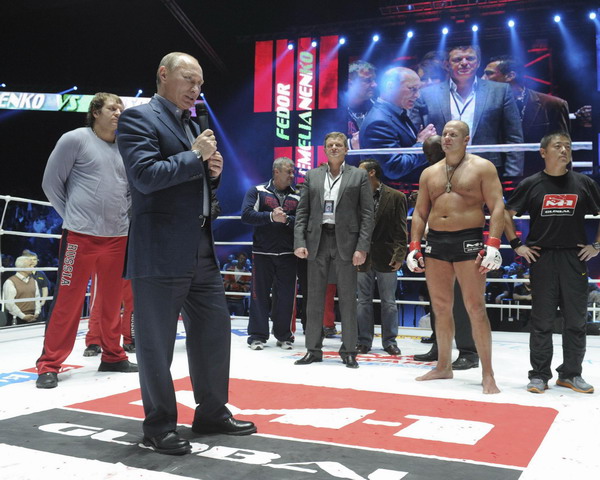 Putin attends MMA event, gets jeered