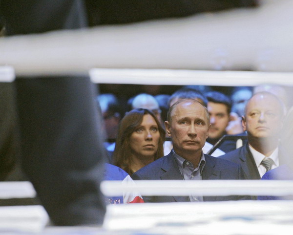 Putin attends MMA event, gets jeered