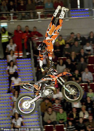 Riders demonstrate their skiils and bravery during the 'Night of the jumps' competition at the International Motorcycling Federation (FIM) Freestyle Motocross (FMX) World Championship in Gdansk, Poland. In photos: Poland FIM freestyle motocross championship
