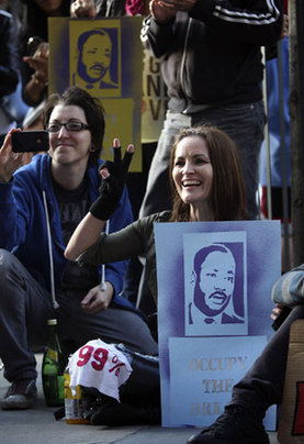 Eddie Daniels gestures as activists with Occupy Los Angeles unite with African American faith and clergy community members to hold an 'Occupy the Dream' rally in honor of American civil rights icon Dr. Martin Luther King outside the Los Angeles Federal Reserve Bank offices on Martin Luther King Day in Los Angeles, California January 16, 2012. Martin Luther King Day marked in US