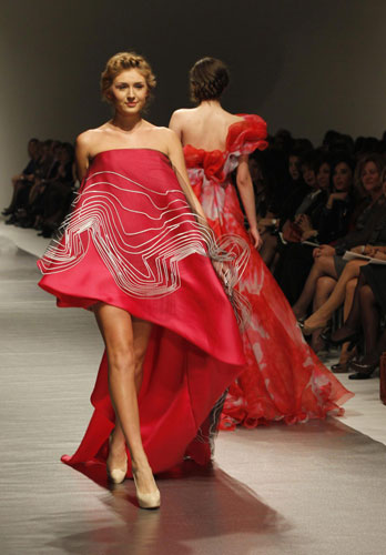 A model presents a creation by Lebanese designer Georges Chakra for his collection of Spring Summer 2012, during a fashion show in Beirut January 18, 2012. Fashion show kicks off in Lebanon