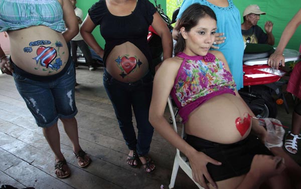Mothers-to-be show off painted bellies