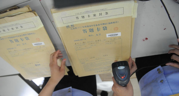 Police officials scan 2.7m exam papers