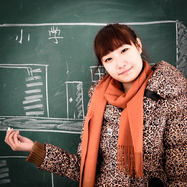 Yang Aijing, 21, exchanged a pair of rings to help get a rural school built for poor children. Good Samaritans of 2012