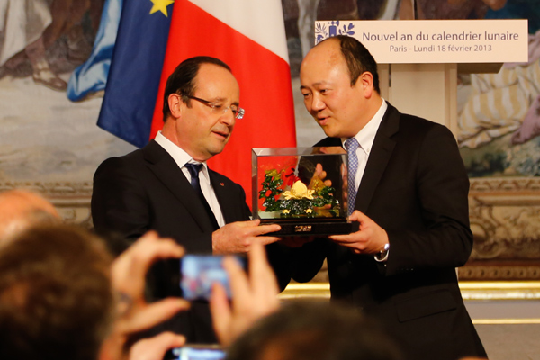French President Francois Hollande speaks to the Asian community at a reception to celebrate the Chinese New Year at Elysee Palace. Hollande addresses Chinese New Year party
