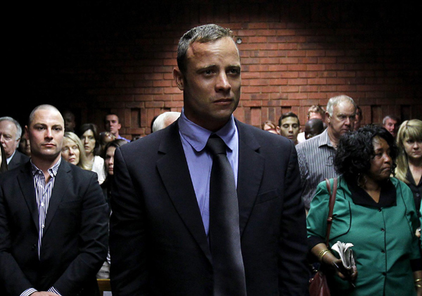 Pistorius, a double amputee who became one of the biggest names in world athletics, was applying for bail after being charged in court with shooting dead his girlfriend, 30-year-old model Reeva Steenkamp, in his Pretoria house. Pistorius shot girlfriend through door - prosecutor