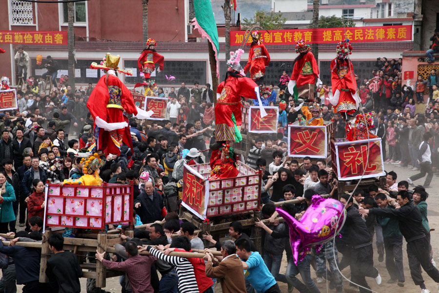 An event named Zou Gushi is held in Luofang village in Fujian province, Feb 24, 2013. Many facets of Lantern Festival across China