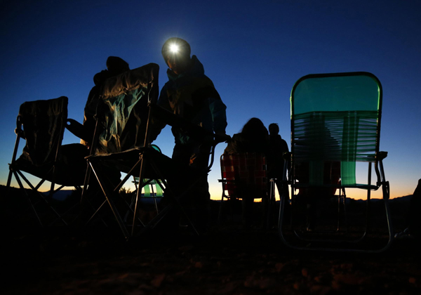 UFO tour operator Kim Carlsberg leads vehicles into the desert during an Unidentified Flying Object (UFO) tour in the desert outside Sedona, Arizona Feb 14, 2013. UFO tour in desert