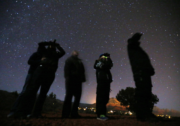 UFO tour operator Kim Carlsberg leads vehicles into the desert during an Unidentified Flying Object (UFO) tour in the desert outside Sedona, Arizona Feb 14, 2013. UFO tour in desert