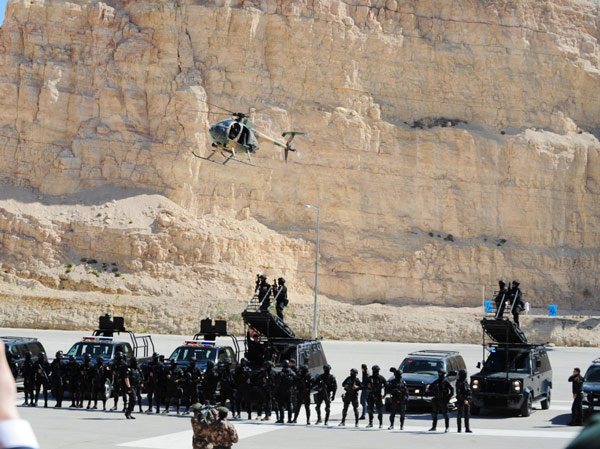 The Jordanian Armed Forces conduct an anti-terror drill during the Fifth Warrior Competition of international Special Forces, in Amman, capital of Jordan, March 24, 2013. Altogether 33 teams from 18 countries including China, Russia, America, France, Saudi Arabia, Iraq and Jordan take part in the competition from March 24 to 28. The competition will showcase the skills of counter-terrorism and Special Forces operations. This demonstration of marksmanship, endurance and teamwork will highlight the capabilities of nations to confront terrorism within the global community. Olympics for world's Special Forces