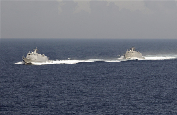 Taiwan military vessels take part in a joint marine drill with coast guard patrol vessels in waters off southern Taiwan, May 15, 2013. Taiwan launches marine drill