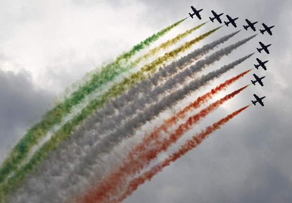 Members of the Italian aerobatic team Frecce Tricolori perform during the AirPower 13 air show at the Hinterstoisser air base in Zeltweg June 28, 2013. Austrian air show opens