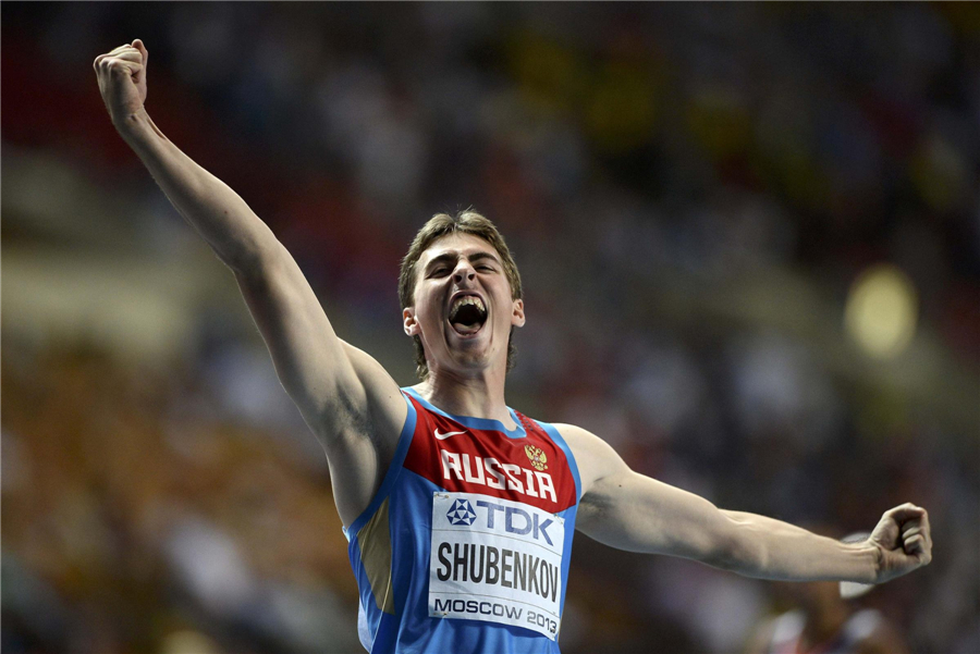 Sergey Shubenkov of Russia celebrates winning third place in the men's 110m hurdles final during the IAAF World Faces of triumph and defeat at athletics worlds
