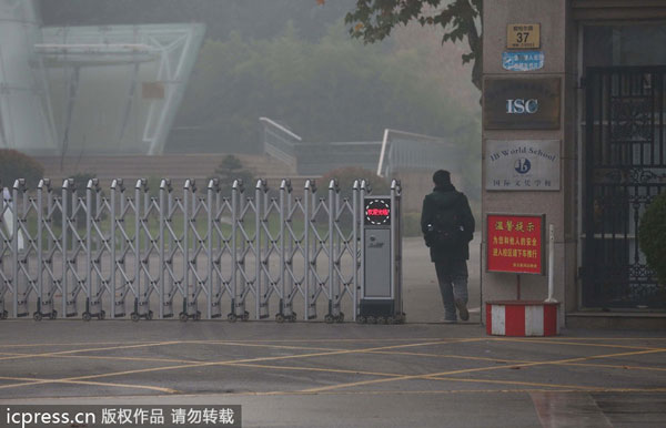 Smoggy E China city suspends classes