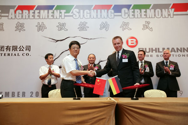 Yan Jiqing, Director of Material Management Department, China Guodian Material Group and Jorg Kluever Chief Operating Officer, Buhlmann GmbH, at the signing ceremony. Buhlmann Group, Guodian ink frame agreement
