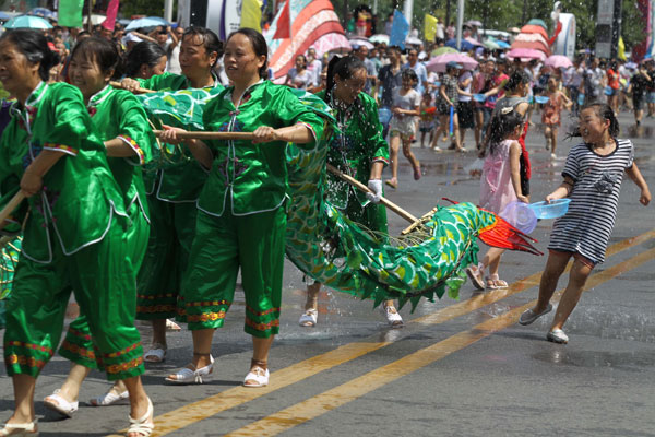 The annual water festival is held in Kaili, Southwest China's Guizhou province, on Wednesday. Water Festival in SW China