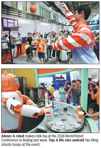 Beijing-developed robots rock at world conference