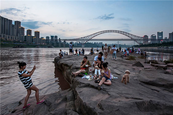 Photographer captures life in ‘City of Bridges’