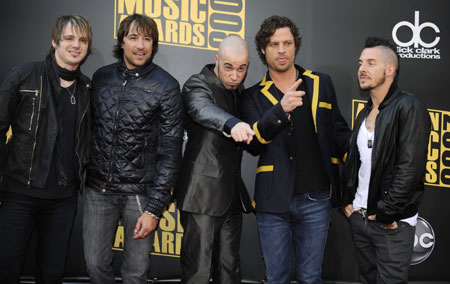 Singer Chris Daughtry (C) and his band Daughtry arrive at the 2008 American Music Awards