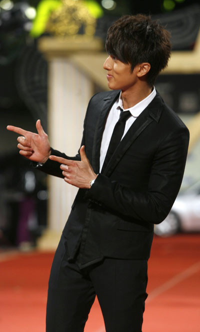 Singer Wu Chun of boyband Fahrenheit arrives at the 45th Golden Horse Awards