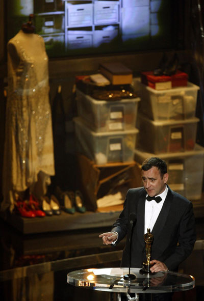 O'Connor holds his Oscar for achievement in costume design for 