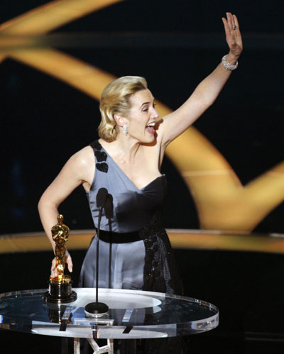 Kate Winslet holds her Oscar for best actress at Oscars