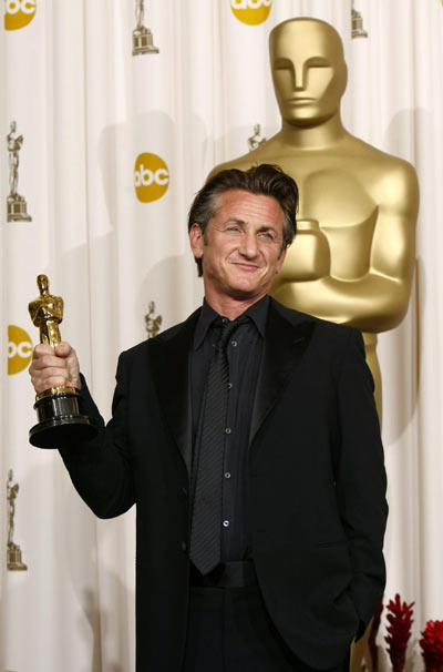 Sean Penn poses with his best actor Oscar at the Academy Awards in Hollywood