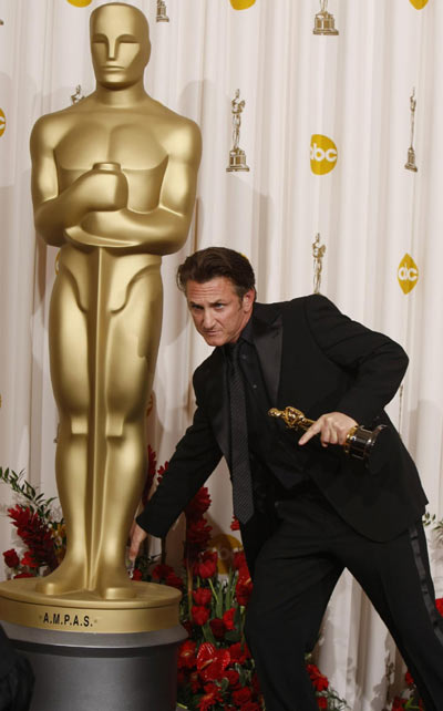 Sean Penn poses with his best actor Oscar at the Academy Awards in Hollywood