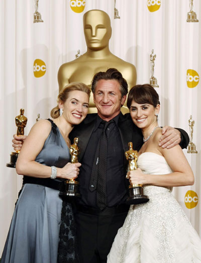 Kate Winslet holds her Oscar for best actress at Oscars