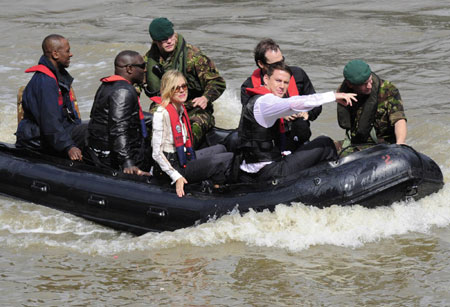 Sienna Miller poses for photographers during a photocall to promote 
