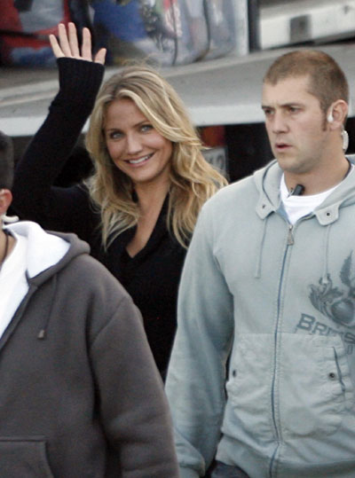 Cruise and Diaz ride motorbike during the filming of