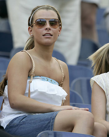 Wayne Rooney's fiancee Coleen McLoughlin waits in the stands before the start of the Group B World Cup 2006 soccer match between England and Paraguay in Frankfurt June 10, 2006.
