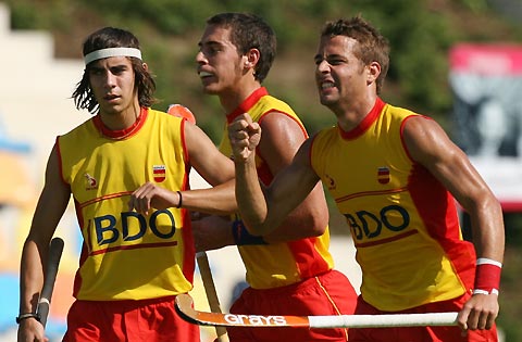 South Korea's Jong Hyun Jang (R) and Hyo Sik You celebrate after scoring against India during their Men's Field Hockey World Cup match at the Warsteiner Hockey Park stadium in Moenchengladbach September 11, 2006. South Korea won the game 2-1.