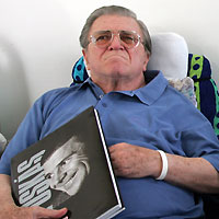 Hungarian soccer legend Ferenc Puskas sits in his hospital room in Budapest in this September 23, 2005 file photo. Puskas died in hospital on November 17, 2006, following a long illness, national news agency MTI said. 