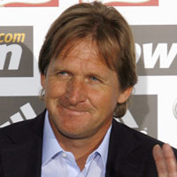 New Real Madrid coach Bernd Schuster of Germany waves during his presentation at Madrid's Bernabeu stadium, July 9, 2007. 