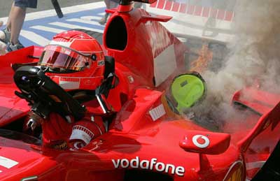 Shumacher's Ferrari catches fire