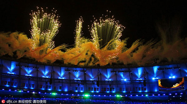 Rio opens Olympics with colors, curves and coolness
