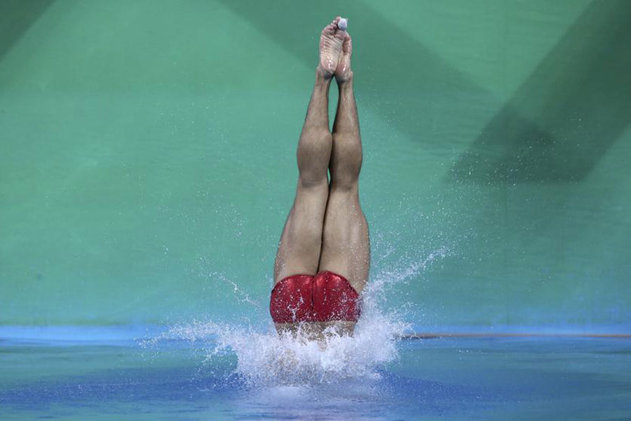 China's Cao Yuan makes up for synchronized loss with individual gold