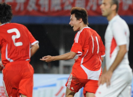 China beats Iran to give new coach first win 